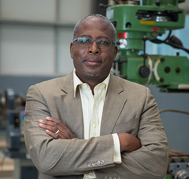 Dr. Fred McBagonluri